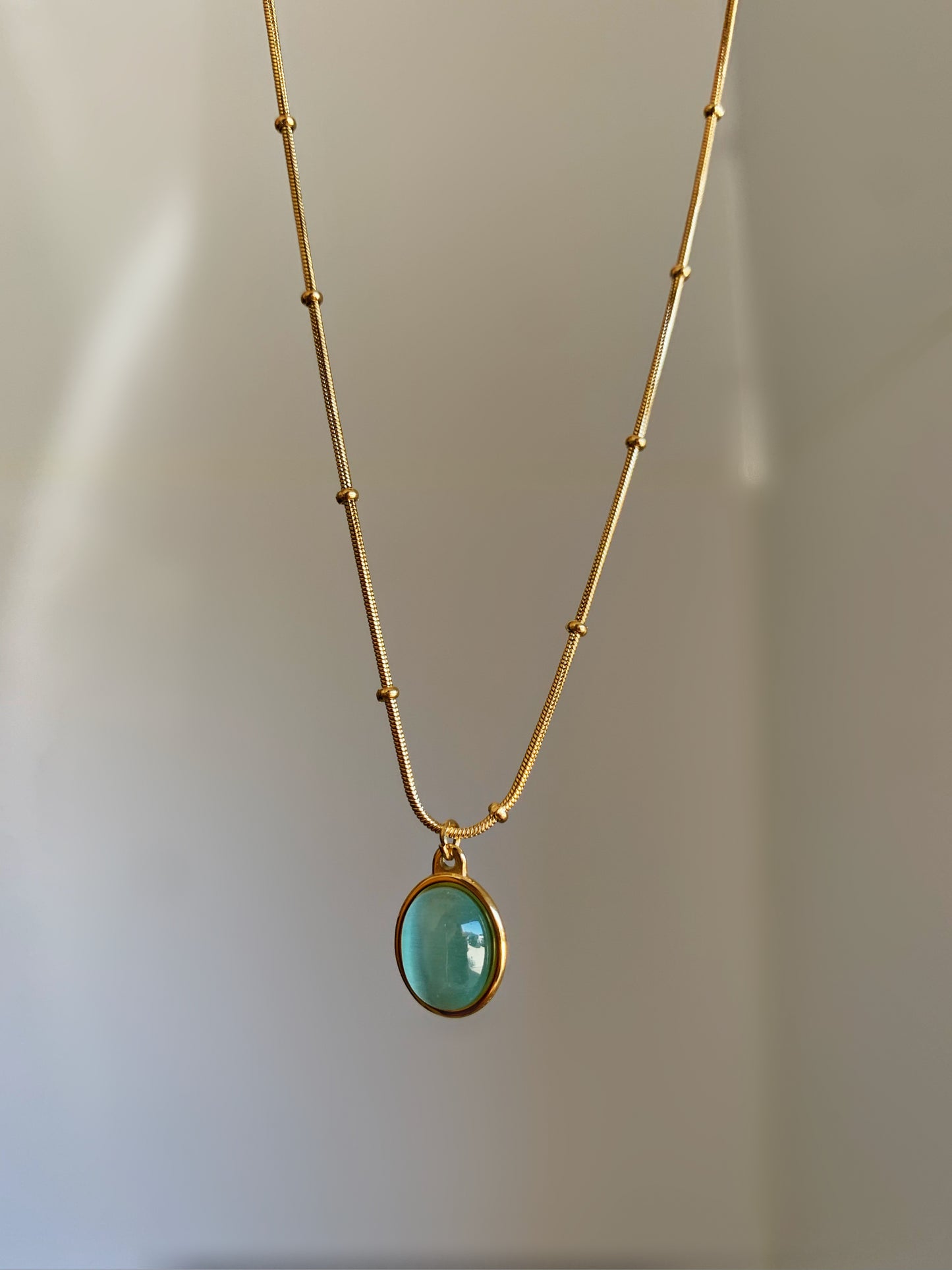 Gold Turquoise Stone Pendant